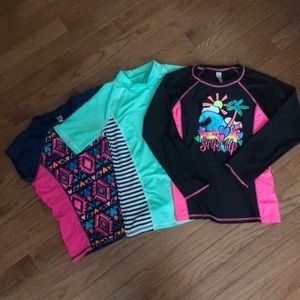 Set of 3 rash guards size M (7/8)